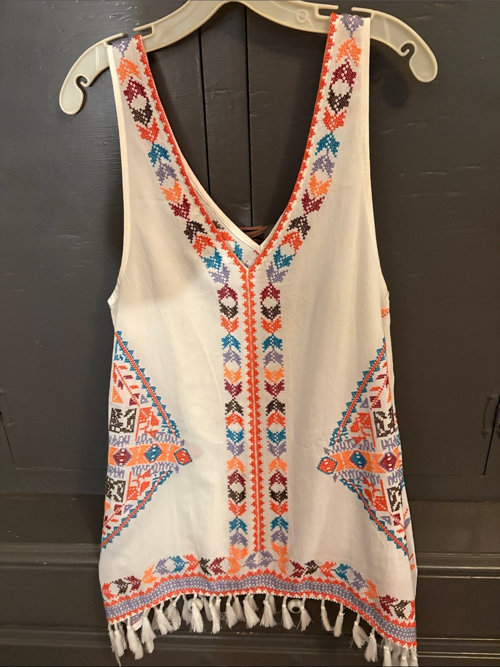 Embroidered White Sleeveless V-Neck Tunic with Fringe